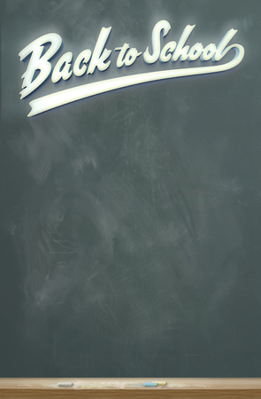 An image of a chalkboard with the words "Back to School" in glowing white script letters.の写真素材