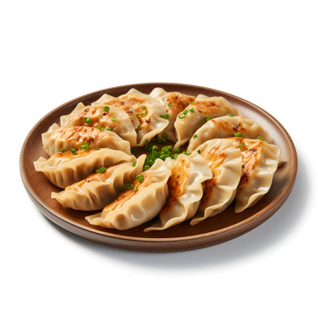 Gyoza on plate isolated on white backgroundの素材
