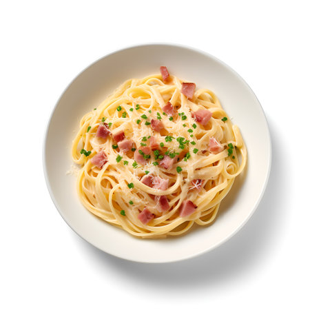 Fettuccine Carbonara on plate  isolated on white backgroundの素材