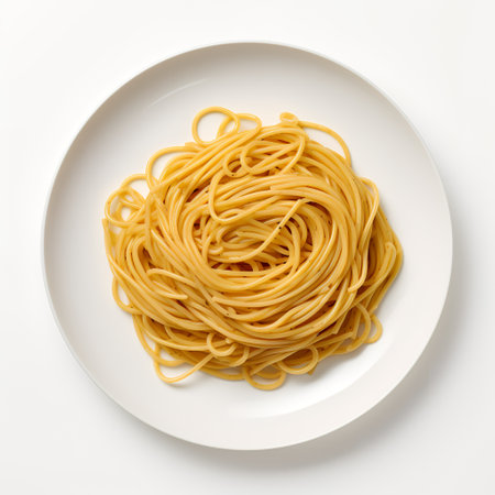 Spaghetti on plate isolated on white backgroundの素材