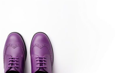 Pair of purple shoes isolated on white background with copy space.の素材