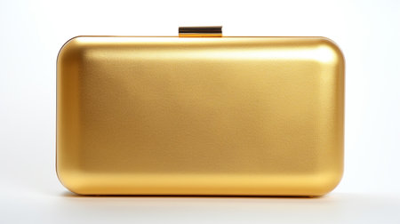Gold Minaudiere Bag isolated on white background with copy space for advertisementの素材