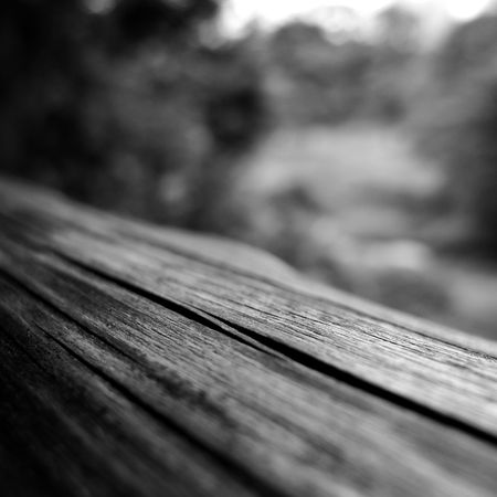 Wooden handrail in a calm Japanese traditional style park. Taken in Koishikawa Park, Tokyo, Japanの写真素材