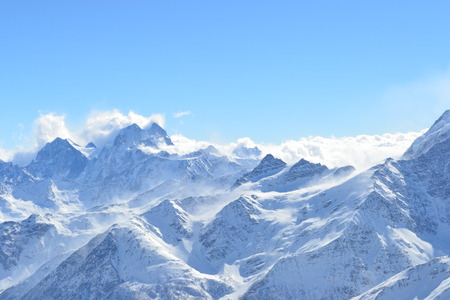 Beautiful view on the mountains. Nice winter mountains landscape. Snow lies on the surface of the...