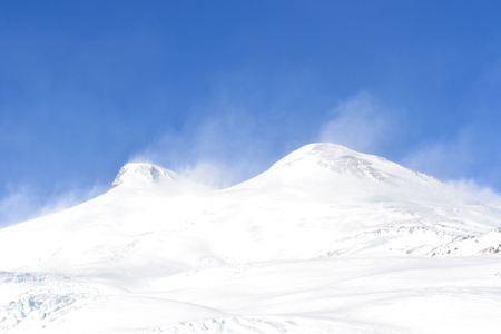 Beautiful view on the mountains. Nice winter mountains landscape. Snow lies on the surface of the...