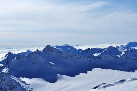 summits and peaks with sky and clouds.の写真素材