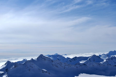 beautiful view of clouds crossing the mountain ridge. awesome mountainの写真素材