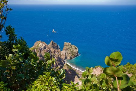 View of turquoise coast from heights of remote tropical islandの写真素材