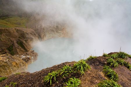 Remote boiling lake on tropical islandの写真素材
