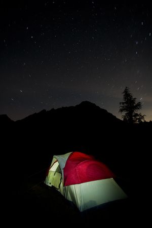 Starry night of camping in the Rocky Mountains, Kananaskis Country, Alberta, Canada.の写真素材
