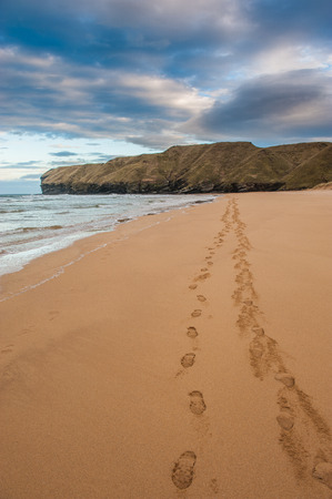 Footprints in the sand, Strathy Bayの写真素材