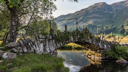 The Slaters Bridge in Little Langdale in English Lake District crossing the River Brathy