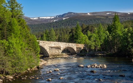 The old bridge over the river Dee at Invercauld near Braemar in the highlands of Scotlandの写真素材