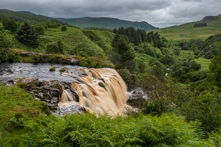 The Loup of Fintry waterfall onf the River Endrick is located approx. two miles from Fintry village,...