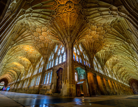 The very elegant Cloisters in Gloucester Cathedral showing its arches and also its very intricate and unique architecture.のeditorial素材