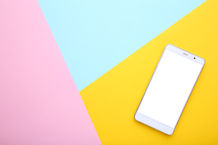 Mobile phone with blank screen on colorful background. Smartfone whiteの写真素材