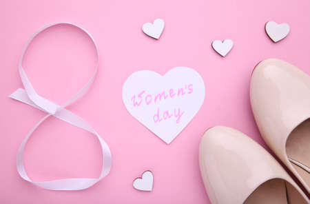 Womens Day concept with accessories on a pink backgroundの写真素材