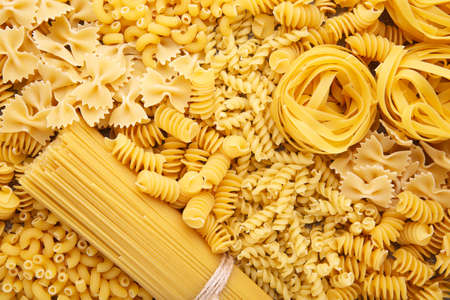 Delicious mixed pasta background, macro foto with pastaの写真素材