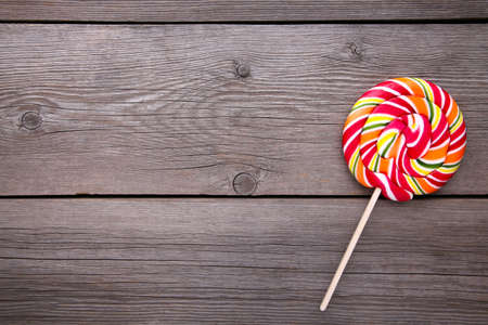 Colorful lollipop on gray background. Studio shotの写真素材