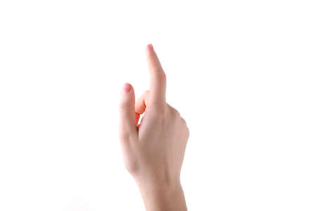 Female hand gesture isolated on a white background, close upの写真素材