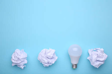 Crumbled paper on a blue background, flat layの写真素材