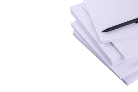 Stack white paper with pen isolated on a white background