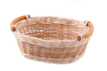 Empty wicker basket isolated on white backgroundの写真素材