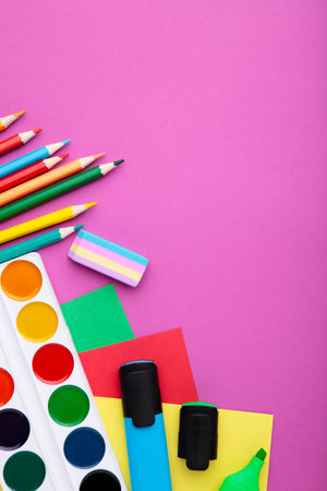 Back To School concept. School supplies on pink background with copy spaceの写真素材