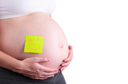 Pregnant woman waiting for a boy or girl, cut outの写真素材