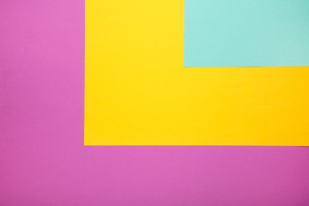 Multicolor background from a paper of different colors, top view