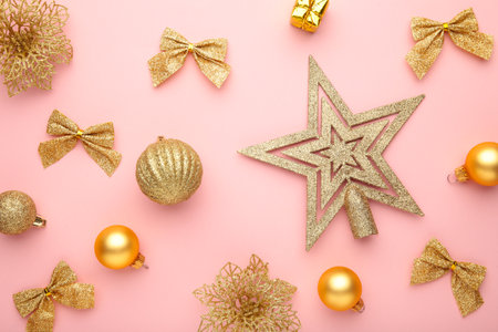 Christmas composition with gold decoration on pink background. Christmas conceptの写真素材