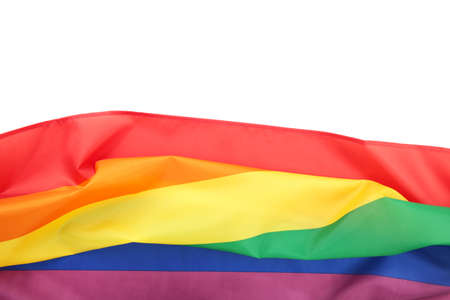 Rainbow LGBT flag on yellow background, top view