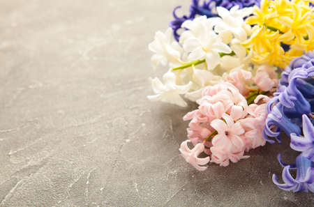 Beach accessories with palm leaves on pink wooden background with copy spaceの写真素材