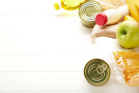 Food donations on the white background. Copy space