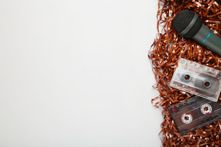 Microphone and cassette on gray background. Top viewの写真素材