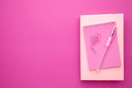 Back to school concept on pink background. School stationery with copy spaceの写真素材