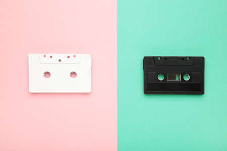 Two old colorful cassettes on a colorful background. Music day, top viewの写真素材