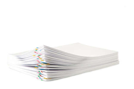 Colorful paper clip with pile of overload white paperwork isolated on white. Top viewの写真素材