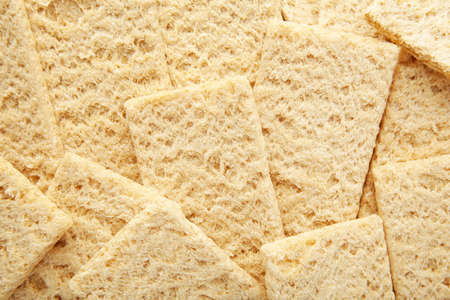 A slices of wheat crispbread background. Healthy food. Top viewの写真素材