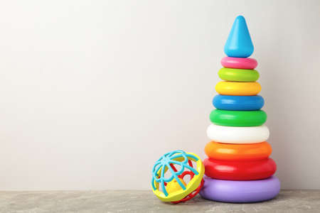 Toys collection for baby on gray background. Top viewの写真素材