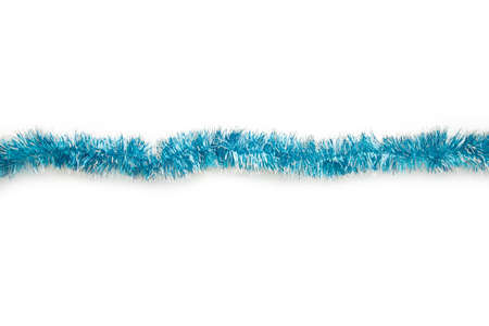 Christmas blue tinsel isolated on white background. Top view.