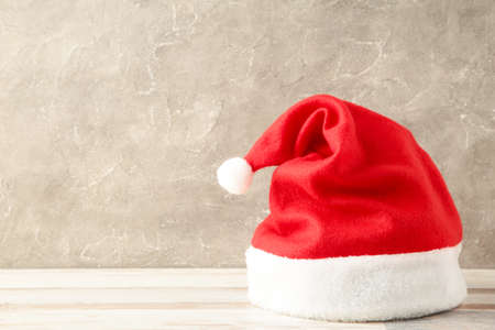 Single Santa Claus red hat on gray background.の写真素材