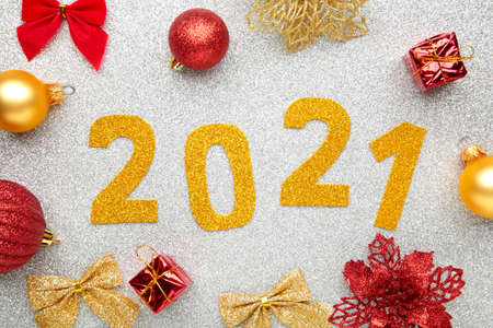 Happy New Year. Symbol from number 2021 and decoration on silver background. Top view.の写真素材