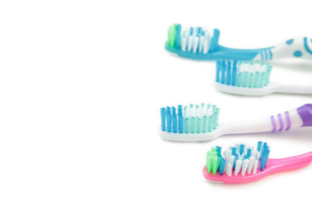 Toothbrushes isolated on white background. Top view