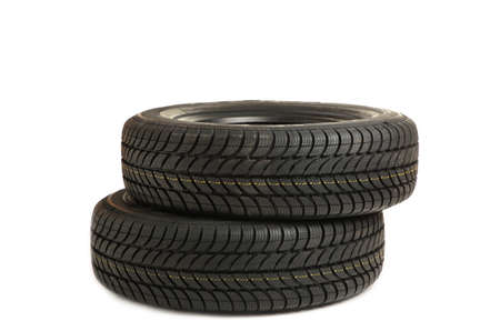 New tires pile isolated on white background. Top view