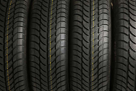 Tire stack background. Selective focus. Studio foto
