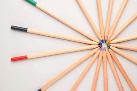 Colored pencils on the gray background. Top view.の写真素材