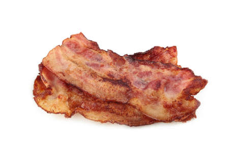 Crispy strips of bacon isolated on white background. Top viewの写真素材