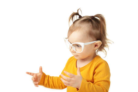 Portrait of beautiful happy little girl in sunglasses isolated on white. Top viewの写真素材