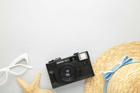 Traveler accessories on pink background. Travel vacation concept. Summer background.の写真素材